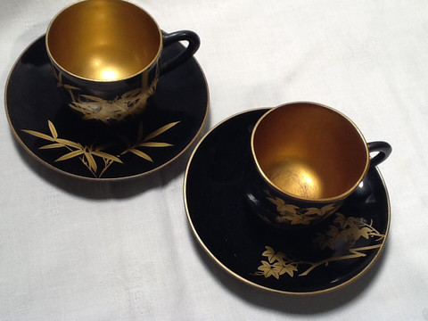 Pair of wood Japanese demitasse cups and saucers